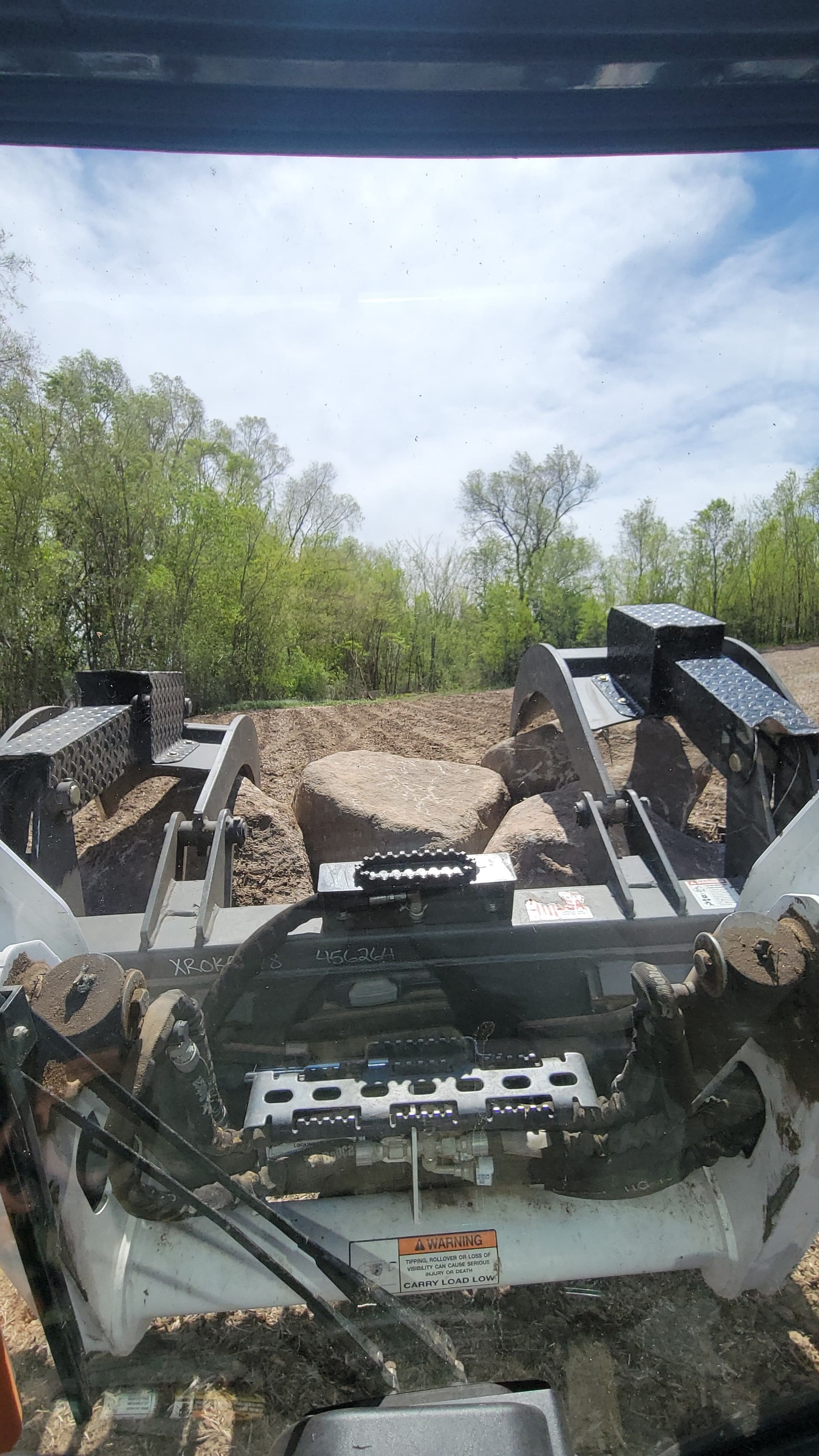 Sourcing Natural Boulders for a Retaining Wall Build image
